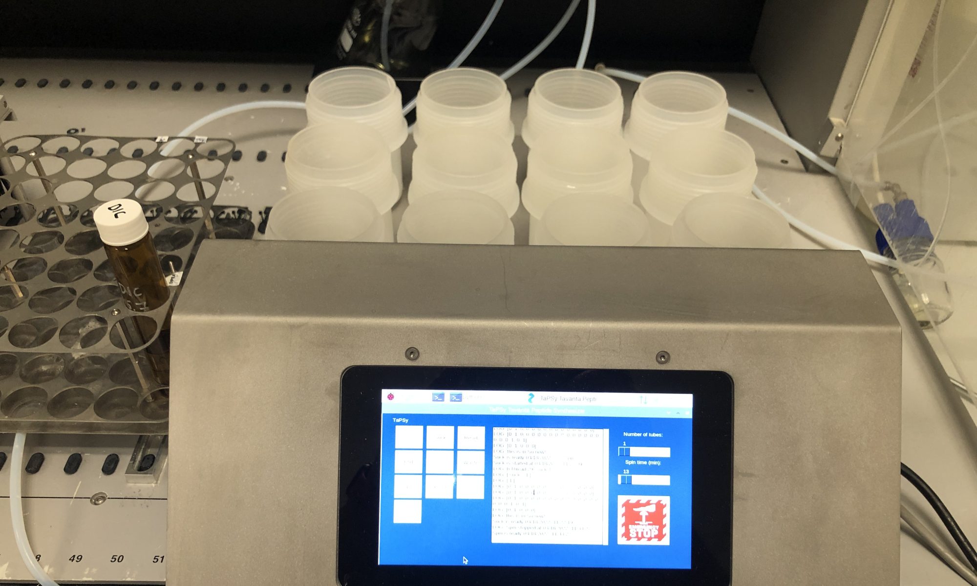 Automated robotic system for parallel solid-phase peptide synthesis with touchscreen control